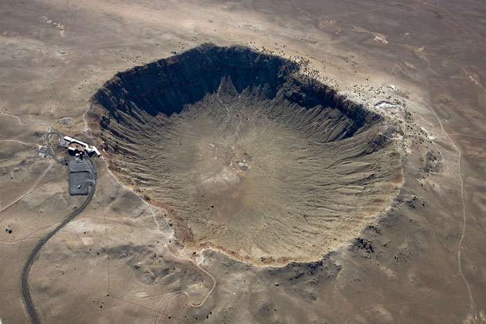 Crater in the Arizona desert formed by a meteorite crashing into the surface of the earth.