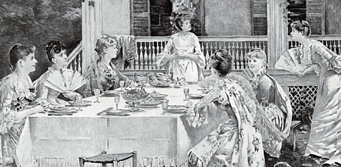 Ladies having lunch outdoors.