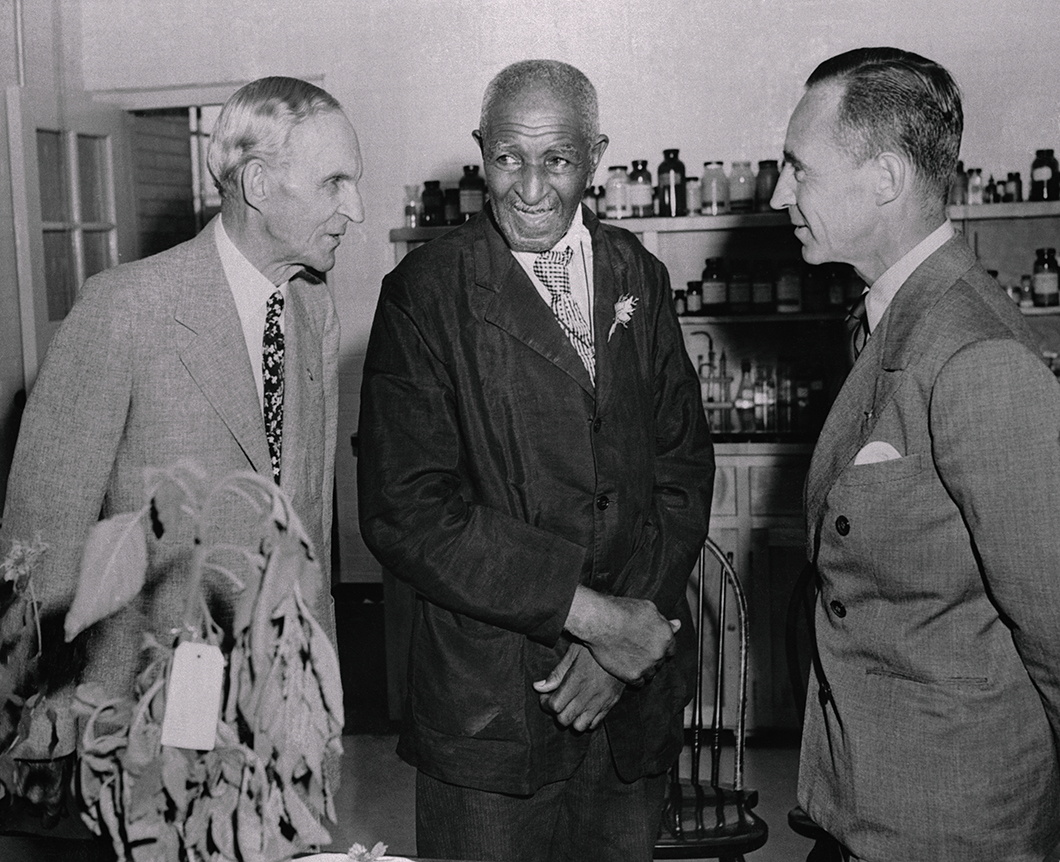 George Washington Carver with Henry Ford and Edsel Ford.