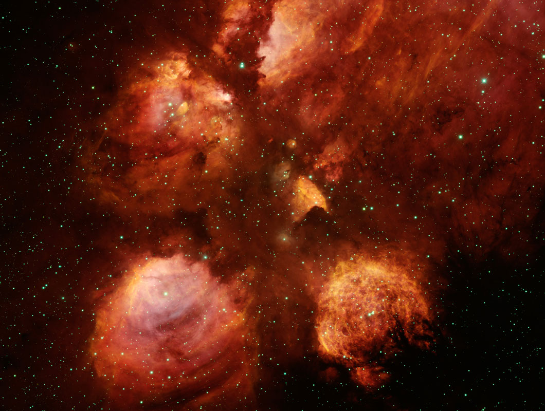 Four balls of gas join together at a center point.