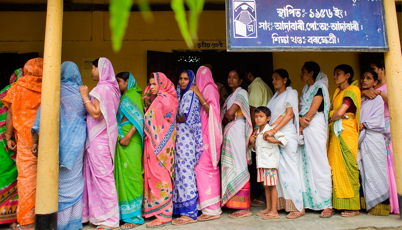 Photo of Indian women lined up to vote.