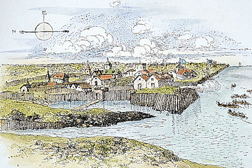 Small villiage on the shore surrounded by a high fence.