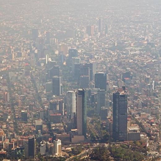 Layer of smog sits over a large city.