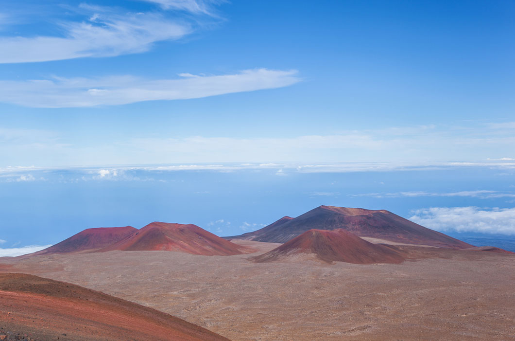 Volcano with sloping sides and broad base.