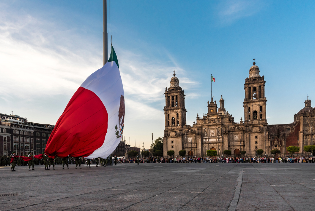 A large plaza in front of a large building.