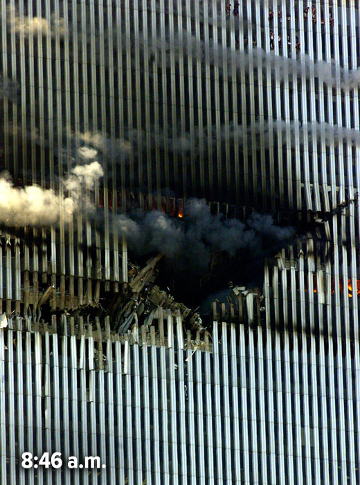 A jagged hole with smoke in the side of the North Tower, with a time stamp of 8:46 a.m.