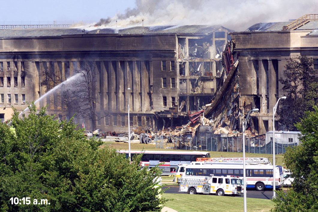Damaged Pentagon building, with a time stamp of 10:15 a.m.