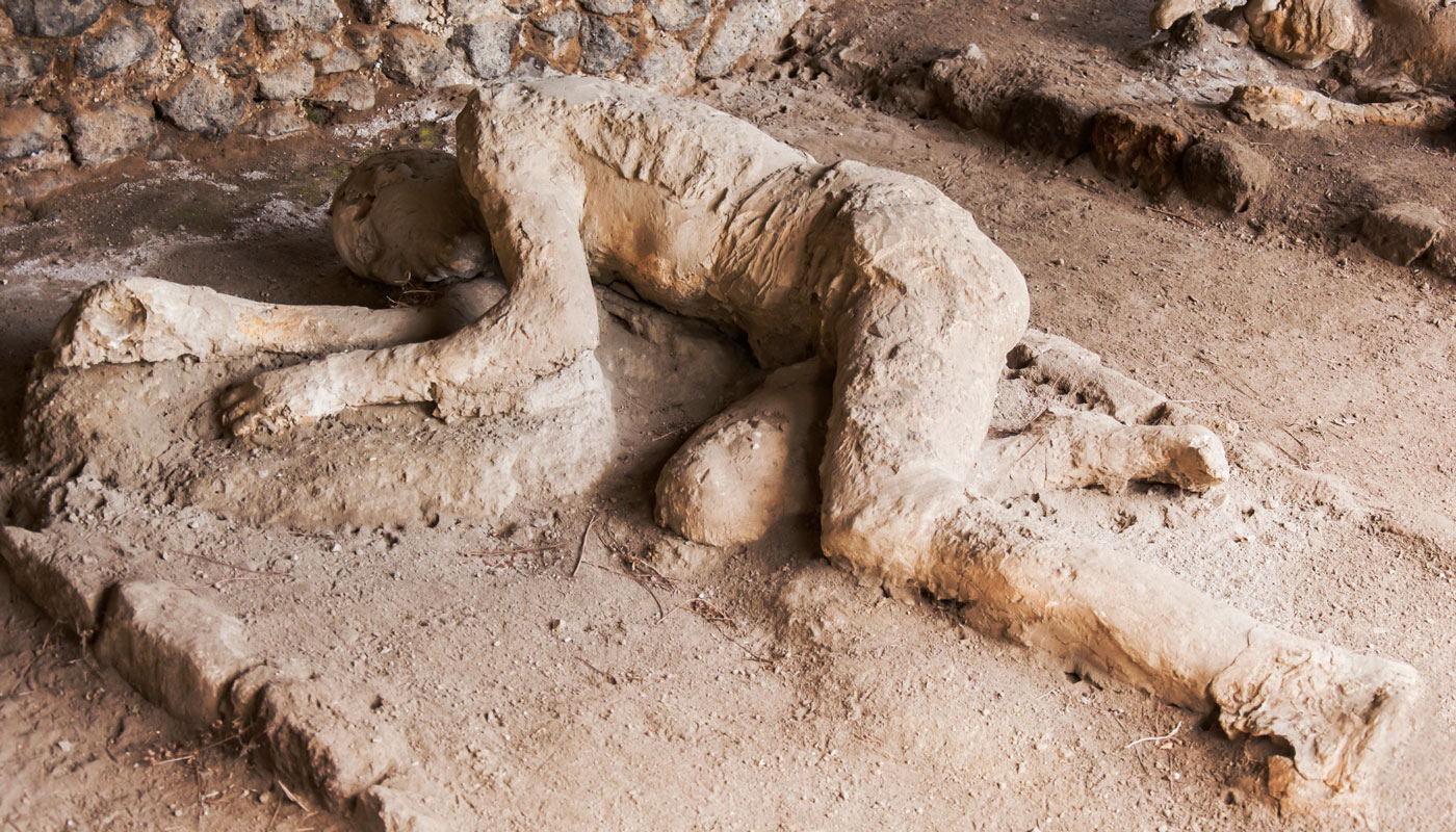 Human remains covered in ash. 