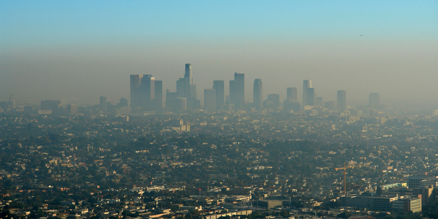 Layer of smog hangs over a large city.