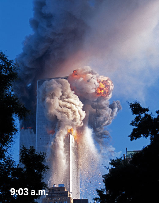 A fiery, smoky explosion of the North Tower, with a time stamp of 9:03 a.m.