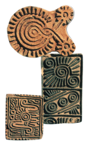 Stamps with squiggly designs on them. 