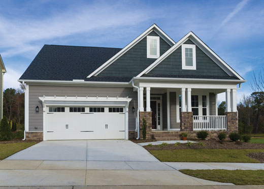 Front of a modern house in the suburbs.