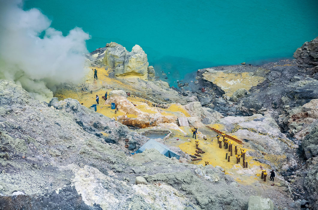 Workers mining sulfur.