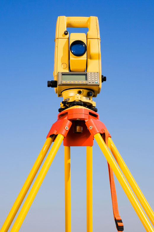 Camera used to observe changes in volcanoes. It sits on a tripod.