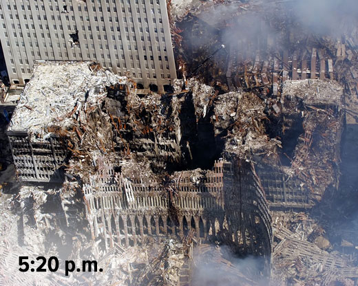 Smoke rising from the remains of the collapsed World Trade Center, with a time stamp of 5:20 p.m.