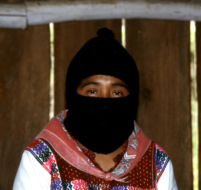 Zapatista man wearing a mask with just his eyes showing.