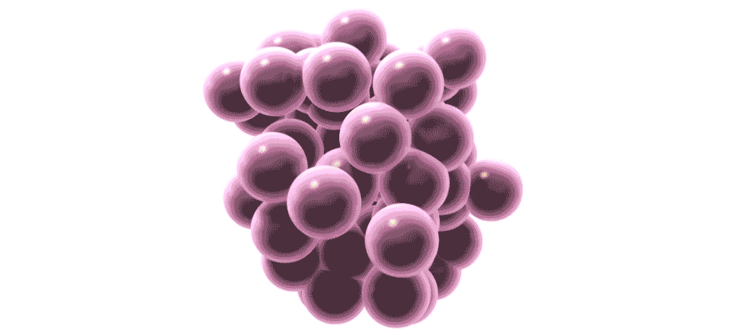 Animation zooms in to show a closeup of one of the balls and the electrons swirling around the nucleus inside.