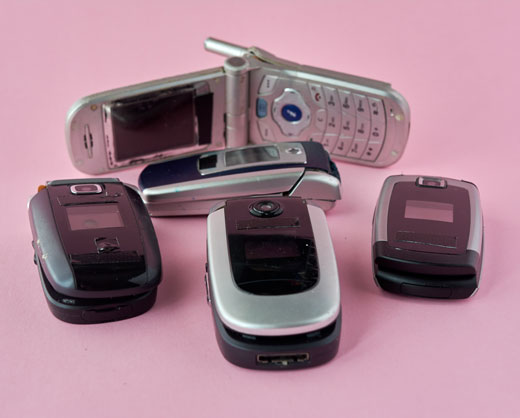 A collection of old cell phones.