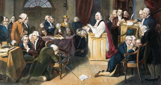 Meeting of the Continental Congress showing men sitting at tables.
