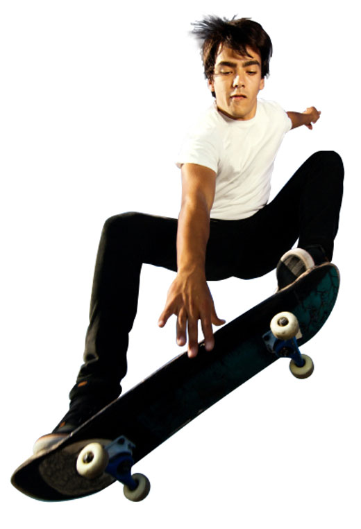 Boy doing a jump while on a skateboard.