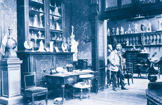 Photo of Bartholdi in his studio.